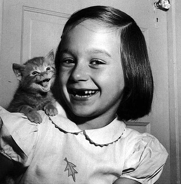 fun small kitty and girl (black & white photo)